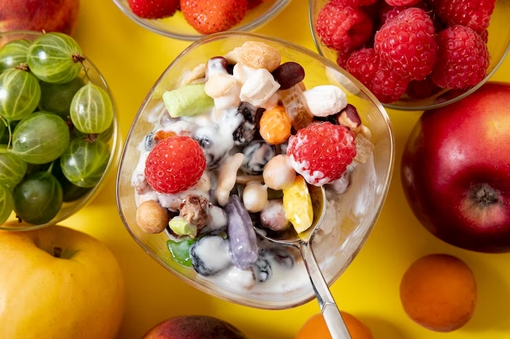 Image by <a href="https://www.freepik.com/free-photo/flat-lay-musli-fresh-fruits-arrangement_5352547.htm#query=Yogurt%20Fresh%20Fruit%20Salad&position=26&from_view=search&track=ais">Freepik</a>