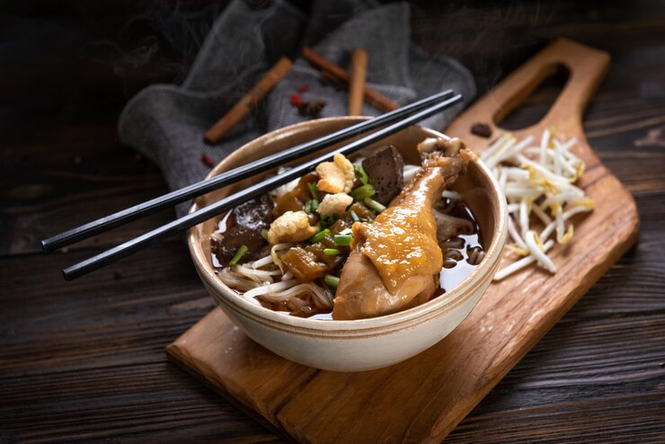 <a href="https://www.freepik.com/free-photo/noodles-with-chicken-leg-chicken-fillet-blood-with-soup-thai-style-vegetable-boat-noodles-selective-focus_14778354.htm#query=Hearty%20Chicken%20Noodle&position=0&from_view=search&track=ais">Image by jcomp</a> on Freepik