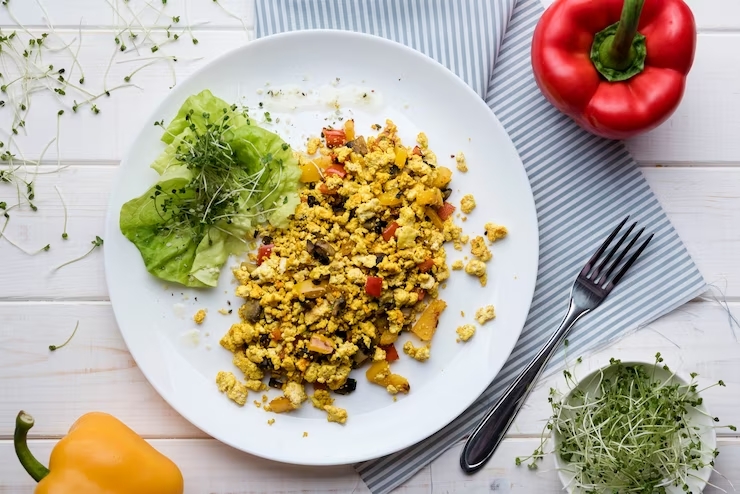 Image by <a href="https://www.freepik.com/free-photo/scrambled-eggs-veggies-salad-with-sweet-peppers_6896995.htm#query=Quinoa%20Stir-Fry&position=3&from_view=search&track=ais">Freepik</a>